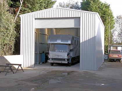 External view of steel structure in white finish with full steel roller door