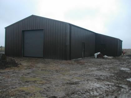 External view of steel building for the Marine Products Company, housing storage facility and mezzanine office space