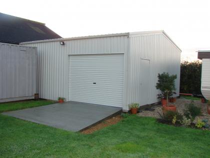Steel framed garage and workshop for motorsport company